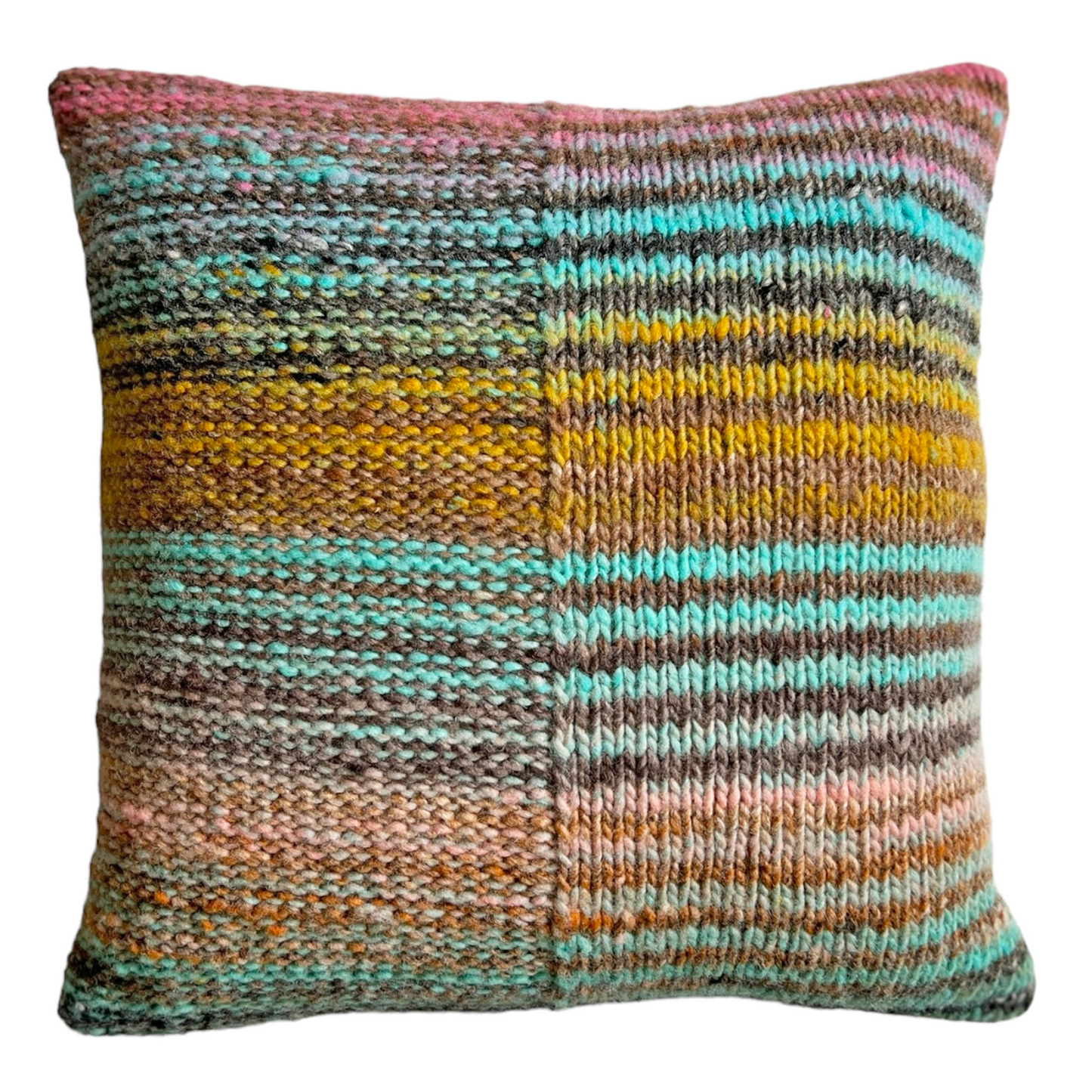 Two sides of the same coin! This hand-knit pillow is split right down the middle, with stockinette on the right and reverse stockinette on the left. Featuring alternative stripes in subtle pastels.