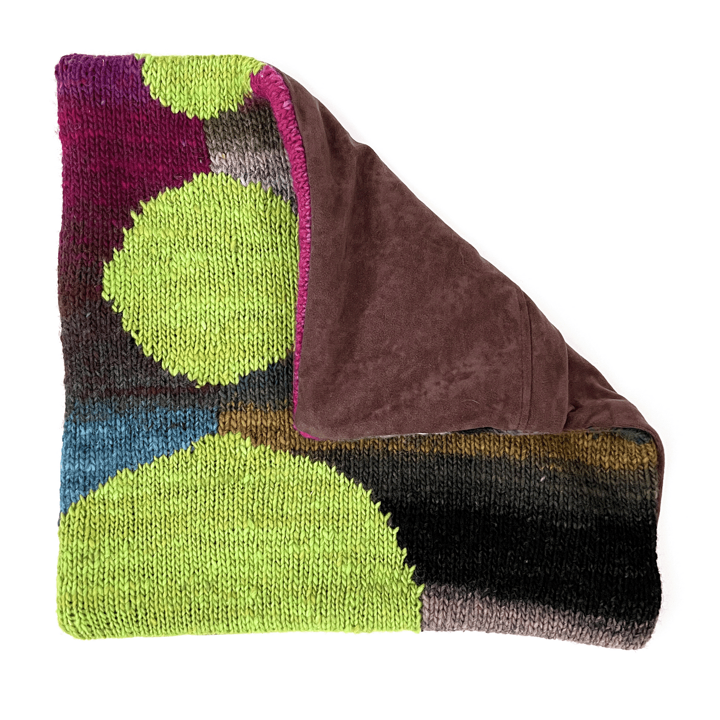 Featuring an envelope-style closure with a hidden zipper, this hand-sewn, removable pillow cover is backed in chocolate brown faux suede.