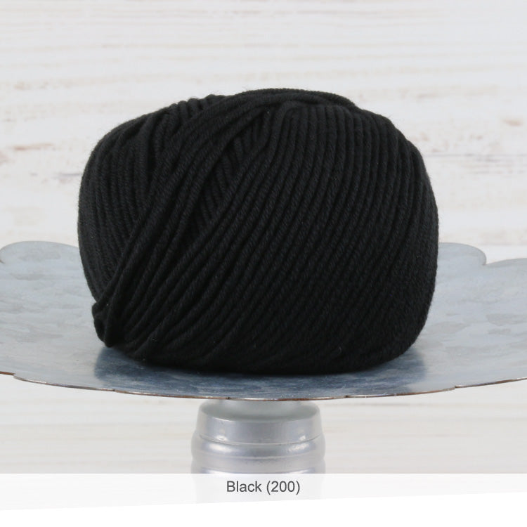 One ball of Trendsetter's Merino VIII superwash wool yarn in color #200 - Black