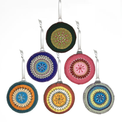 Set of six colorful wool felt ornaments, each featuring concentric circles with vibrant embroidery stitches, displayed in the shape of a Christmas tree.