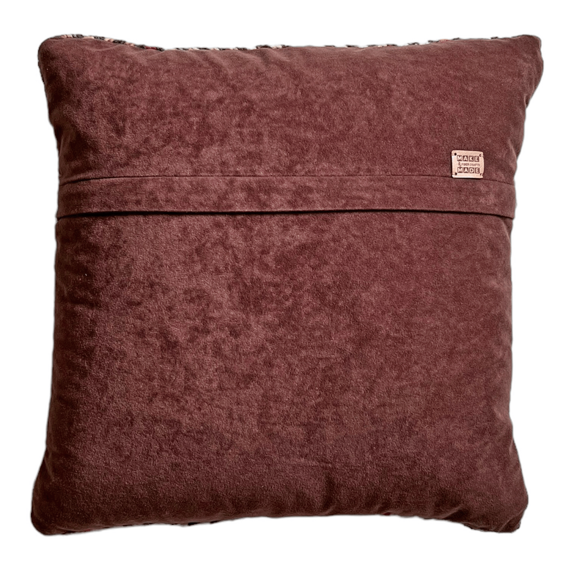 Featuring an envelope-style closure with a hidden zipper, this hand-sewn, removable pillow cover is backed in chocolate brown faux suede.