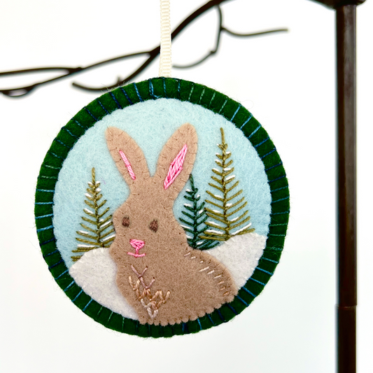 Each Winter Animal ornament is designed by Susan and hand-stitched. Meticulously crafted with 100% merino wool felt and embroidery threads.