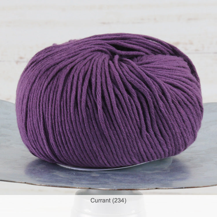 One ball of Jo Sharp's Soho Summer Cotton DK Yarn in color #234 - Currant