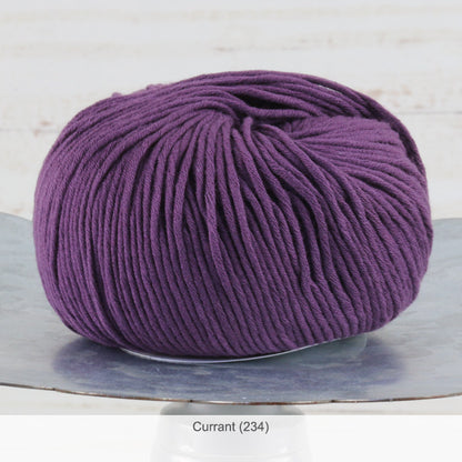 One ball of Jo Sharp's Soho Summer Cotton DK Yarn in color #234 - Currant
