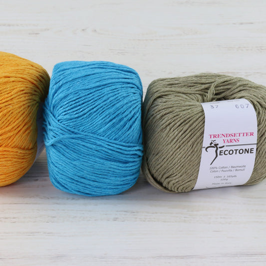 Balls of Trendsetter's Worsted Ecotone Yarn in various colors