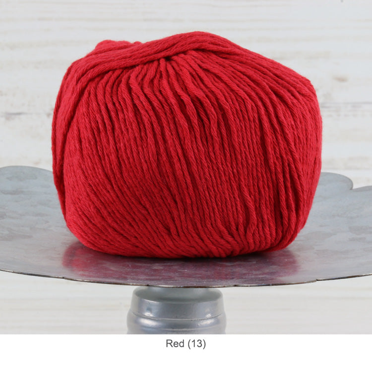 Ball of Trendsetter's Worsted Ecotone Yarn in color #13 - Red 
