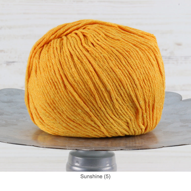 Ball of Trendsetter's Worsted Ecotone Yarn in color #5 - Sunshine 