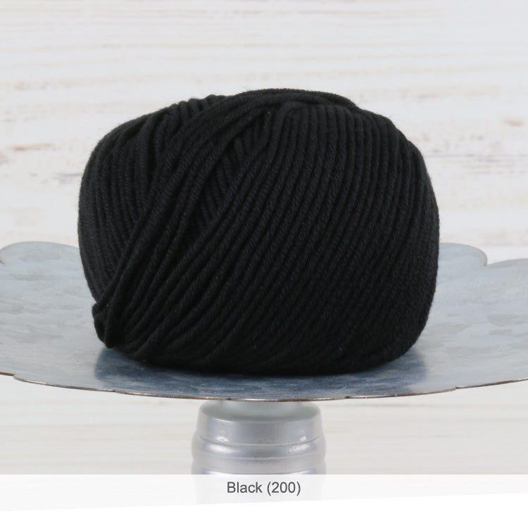 One ball of Trendsetter's Merino VIII superwash wool yarn in color #200 - Black 