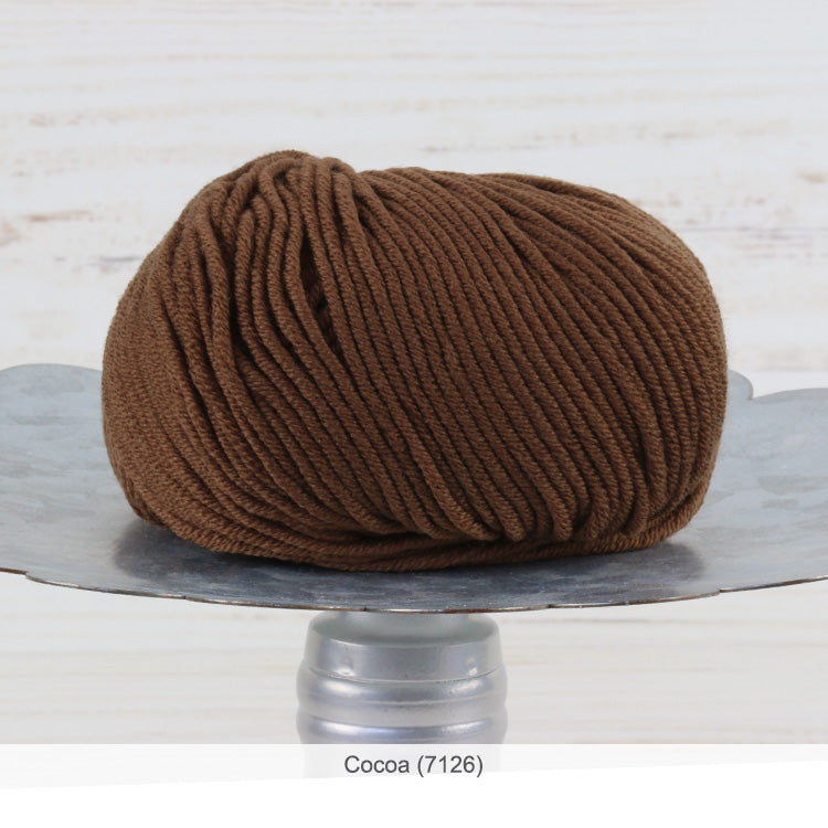 One ball of Trendsetter's Merino VIII superwash wool yarn in color #7126 - Cocoa