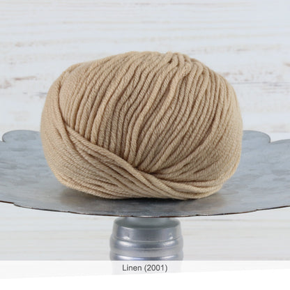 One ball of Trendsetter's Merino VIII superwash wool yarn in color #2001 - Linen