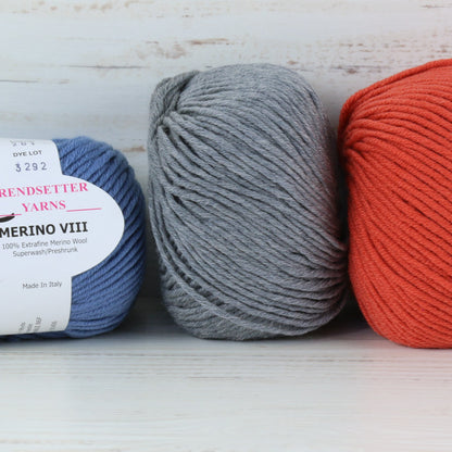 3 balls of Trendsetter's Merino VIII superwash wool yarn in various colors